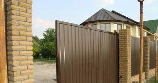 Купить откатные ворота из профнастила Борзя, цена от 1730 руб.